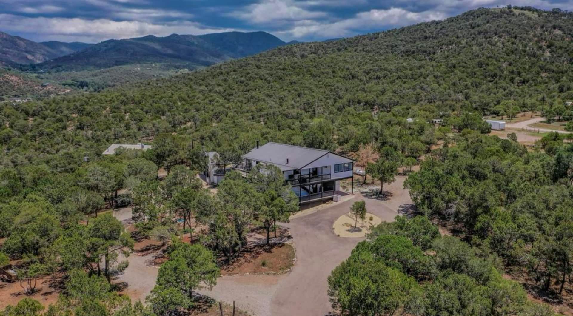 Aerial view of White Wolf Lodge in the pines below the Sacramento Mountains